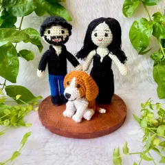 Creating a mini-you is one of my favorite things to do! This set of a couple with their adorable pet beagle was made to be a special keepsake, mounted on a wooden base. I love capturing the little details that make each family unique, right down to their furry friends.
