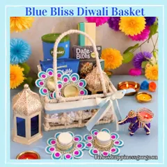 The 'Blue Bliss' Diwali basket is a vibrant mix of color and tradition, featuring snacks, date bites, decorative lanterns, and handcrafted diya holders.