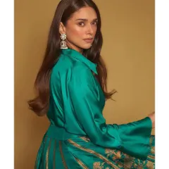 I love mixing modern silhouettes with traditional craftsmanship. For this screening, we styled Aditi Rao Hydari in a stunning emerald green silk shirt paired with a gold brocade skirt from Payal Khandwala. It’s a perfect example of contemporary Indian elegance.