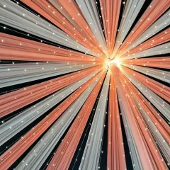 A close-up of a ceiling drape design in peach and white, with fairy lights woven in. This technique creates a beautiful radiating pattern of light and color.