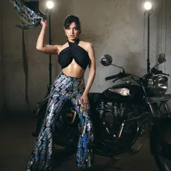 For the promotions of the film 'Yaariyan 2', I styled Divya Khosla Kumar in this edgy and fun look. The combination of a black halter top with iridescent sequin pants from Any Old Iron created a standout look perfect for a high-energy promotional campaign.