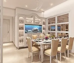 I love bringing a touch of timeless elegance to modern homes. This dining area features a vintage-style display and dining set, complete with a stunning built-in aquarium that becomes a living piece of art.