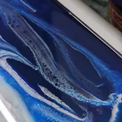 A close-up of the ocean theme I created on the briefcases for Prince Bathware. The swirling blues and whites with lacing effects mimic the movement of water, tying in perfectly with their brand.