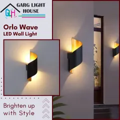 The Orlo Wave LED wall light is a perfect example of brightening up your exterior with style. Its unique curved design casts a beautiful warm light both upwards and downwards, adding an elegant touch to any wall.