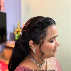 A close-up of the eye makeup for this party look. I used soft pink shades to create a gentle, defined eye that complements the client's features.