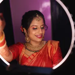 A creative shot using my ring light. This tool is essential for creating flawless makeup, as it provides even, bright light that mimics daylight, ensuring the final look is perfect.