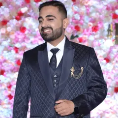 A classic three-piece suit calls for a sharp, defined look. I styled his hair and applied subtle makeup to ensure he looked dapper and ready for the reception party.