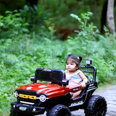 A full view of Vaanya enjoying her ride during our outdoor toddler photography session. Capturing kids interacting with props creates authentic and playful images that tell a story about their personality at this age.