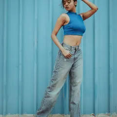 A clean, modern fashion portrait that plays with color and texture. This style is perfect for e-commerce and catalogue photography, where the focus is on the apparel in a crisp, contemporary setting.