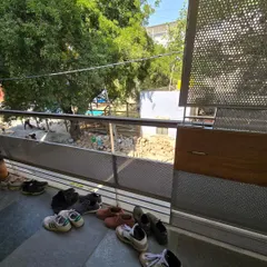 The entrance to my home and office, with shoes left outside by visiting students. This simple image speaks to the welcoming and informal atmosphere I cultivate, where the lines between home, office, and classroom are beautifully blurred.