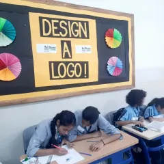 Students hard at work during the "Design a Logo" competition. It was a joy to watch their creative process unfold.