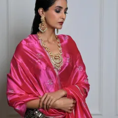 A throwback to a jewellery campaign where I combined a vibrant pink silk shawl with a stunning polki necklace and earrings. The rich colors and textures create a luxurious backdrop that makes the fine jewellery pop.