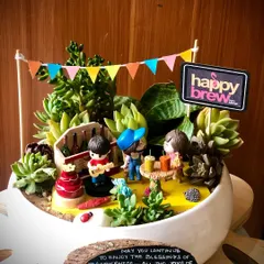 A sweet anniversary garden I made, complete with a mini bar and a cake. It's all about celebrating the little moments and the big milestones together. Happy Anniversary.