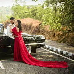 For couples who love a classic vibe, we incorporate elements like vintage cars to add timeless charm to your photoshoot. This pre-wedding session combined a bold red gown with a classic Chevrolet for an unforgettable look.