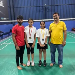 Our girl players showcasing their medals after a successful tournament performance. We are committed to nurturing talent in both boys and girls at our academy.