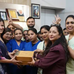 A happy moment with our team and a satisfied client. We celebrate every success and are grateful for the trust our clients place in us.