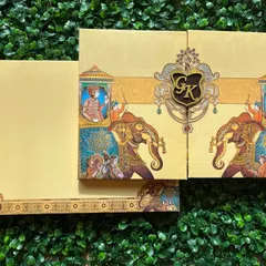 Celebrate your heritage with a vibrant, traditional design. This card features beautifully illustrated royal elephants and a custom monogram, all brought together in a rich color palette that feels both classic and festive.