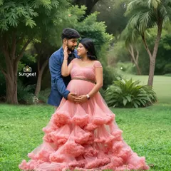 A romantic couple's portrait taken in a beautiful Bangalore park. The soft light filtering through the trees and the elegant pink gown create a true fairytale moment.
