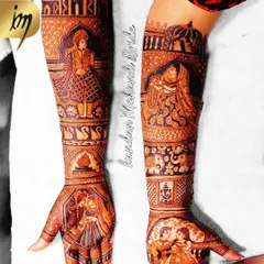 This design combines multiple storytelling elements. The palms show two different romantic couple portraits, while the forearms depict the groom and a bride in her doli, telling the story of their union from different perspectives.