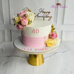 Celebrating 40 beautiful years of love and togetherness. A special anniversary cake for 'Aai & Papa', adorned with elegant florals and sweet memories.