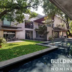 The Aqua Grid house, a nominee for ArchDaily's Building of the Year. The design is organized around a series of water courts and preserves the site's mature trees, creating a residence that is fully integrated with its natural setting.