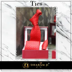 A vibrant red tie and pocket square set. A pop of color like this can completely transform a suit.