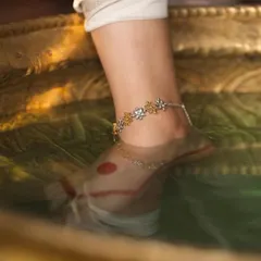 This artistic shot for Shaya's 'Legacy of Rani Lokamahadevi' campaign focuses on a delicate floral anklet. It demonstrates how I can create a narrative around a single piece of jewelry, evoking a sense of history and grace.