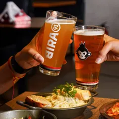 A classic "cheers" moment captured for Bira91. This style of lifestyle photography connects the product with social experiences, making it relatable and aspirating for customers.
