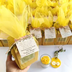 This is what a complete, heartfelt gift looks like. For this Haldi ceremony, we created a custom gift box with a vibrant yellow peony candle and a matching wax sachet, all tied together with a personalized thank you note. It’s the little details that make a big difference.