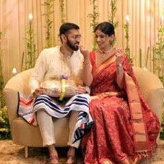 A candid moment from a roka ceremony, where the couple shares a lighthearted interaction. I focus on these natural moments that reflect a couple's true bond.