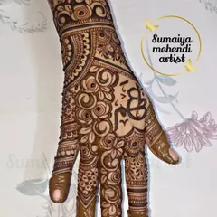 A lovely party henna design with the initials 'S' and 'B' intertwined in a heart. It's a sweet way to add a personal touch to a non bridal design.