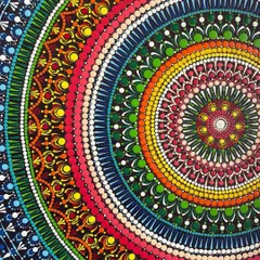 A close-up view of the intricate dot work on my 24-inch mandala. You can see how each dot is carefully placed to create layers of color and pattern, resulting in a mesmerizing and textured finish.