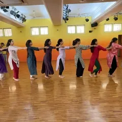 A moment from a choreography session, showing our dancers learning a formation in a line. This kind of coordinated movement is key for our large ensemble pieces.