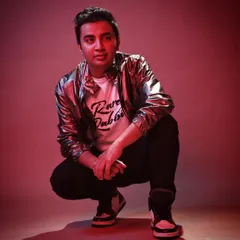 A stylish shot from a photoshoot. I believe an artist's brand is as important as their music, and I bring a sharp, modern style to everything I do.