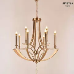 This modern luminary, with its candle-style bulbs and elegant gold frame, is designed for both form and function. It illuminates a room beautifully while adding a touch of classic sophistication, perfect for a bedroom or intimate living area.