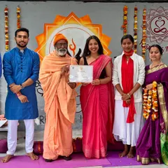 Receiving my Yoga Teacher Training certificate in Rishikesh. This was a foundational step in my journey to blend the worlds of yogic philosophy and creative expression in my workshops.