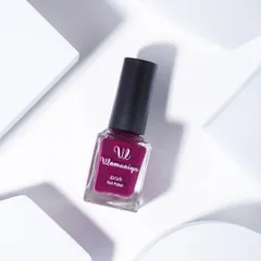 A minimalist and clean product shot for a nail polish brand. I used simple white geometric blocks and controlled shadows to draw all the attention to the product's color and branding.