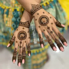 For a modern and elegant look, I create minimalist designs like this one. The clean lines, central lotus mandala, and delicate finger details are perfect for someone who wants a chic yet traditional touch.