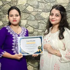 This moment is everything to me. Seeing my student, full of passion and pride, holding her certificate after completing my professional course. This piece of paper is proof of her hard work and the start of her own artistic journey.