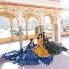 A showcase of my lehenga collection, featuring rich jewel tones like royal blue, mustard yellow, and emerald green. Each piece is designed with unique embroidery and a flattering silhouette.