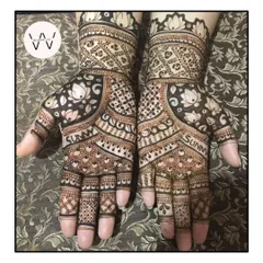 A stunning Karwachauth design with the husband's name "Sunny" incorporated into a beautiful lotus-filled pattern.