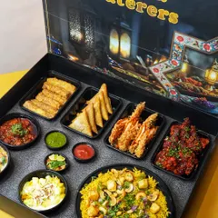 A fully packed Iftaar Box, showcasing a complete meal from pulao and starters to chutneys and dessert. It's a hassle-free feast.