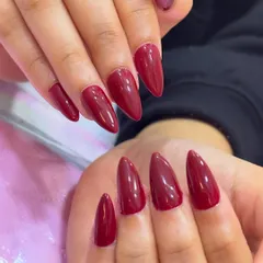 Fierce, bold, and unapologetically classy. This deep red stiletto manicure is the perfect power move, making a statement before you even say a word.