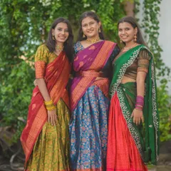 A lovely group portrait of three women in colorful traditional sarees. I ensure everyone looks comfortable and natural in group photos.