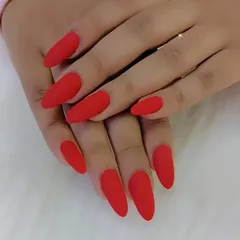 Another shot of the stunning matte red nails, a timeless choice that exudes confidence.