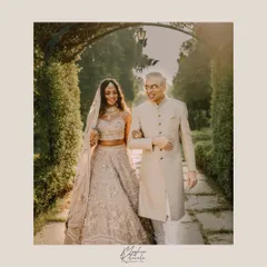A heartwarming moment between the bride and her father. We styled the bride in a stunning Abhinav Mishra lehenga and her father in a classic bandhgala, ensuring their outfits complemented each other perfectly for this milestone walk.
