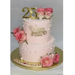 A 25th anniversary deserves something truly special. This two-tiered pearl cake was made with two different flavors, fresh pineapple and chocolate, to please all the guests. It's decorated with fresh roses for an elegant finish.
