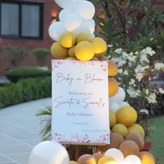 A personalized welcome sign for a "Baby in Bloom" themed baby shower. We coordinate every detail, including the stationery, to match the overall decor of your event.