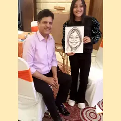 Posing with a happy guest at a birthday party at The Fern Residency in Noida. It's always a pleasure to see the final result bring a smile to someone's face.