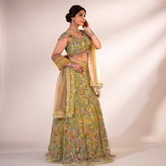 When life gives you a wedding invite, you slay in a green floral lehenga. This piece is all about intricate embroidery and vibrant colors, perfect for a daytime mehndi or sangeet.